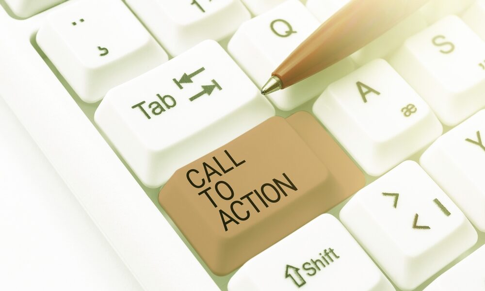 Tecla escrito call to action.